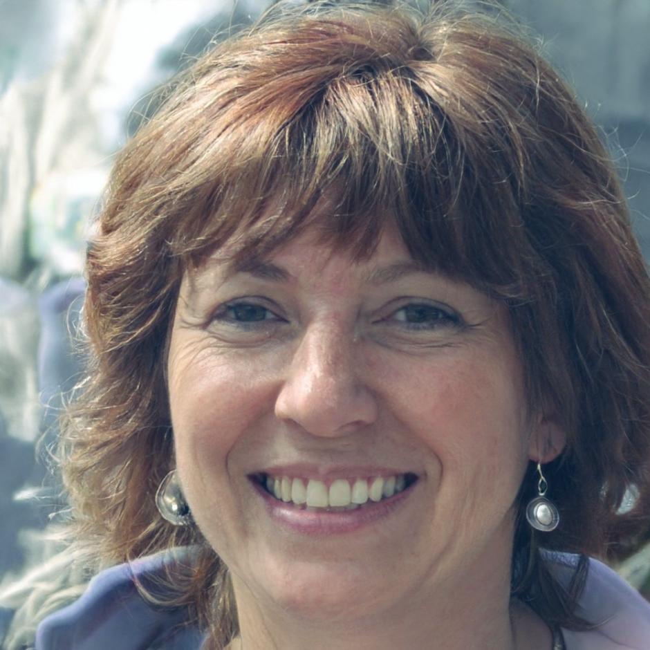 Agricultural technology specialist Dr. Elena Petrakis calibrating precision sensors in orchard system